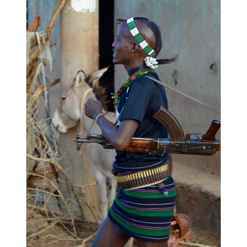 Ethiopie – Guerrier De La Tribu Hammer  Photography by Christian Ebel | ArtMajeur